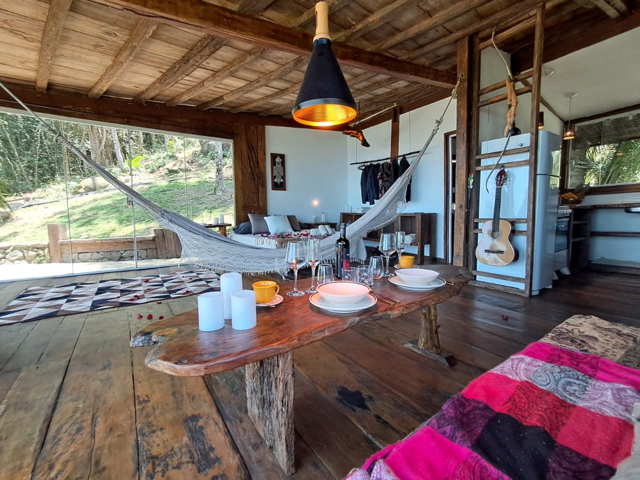 The living room of the existing chalet, with a hammock